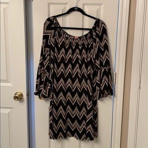 Dress with bell sleeves.